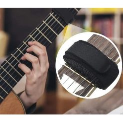 Detailed view of the use of a mute guitar string damper