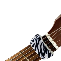 Detailed view of the zebra-patterned guitar string mute