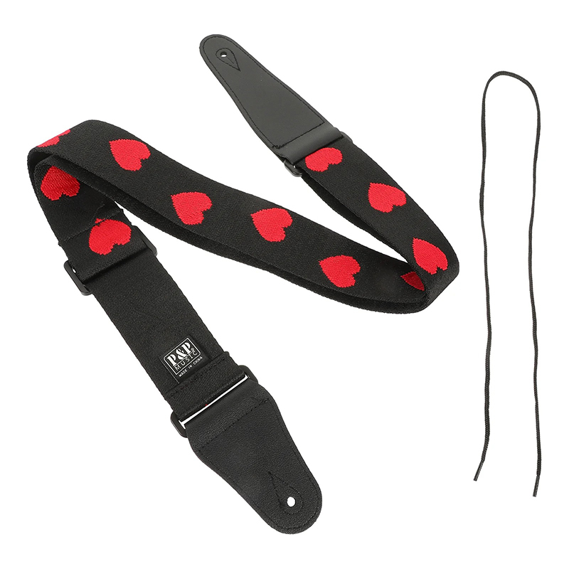 Details of the guitar strap embroidered with burning red hearts