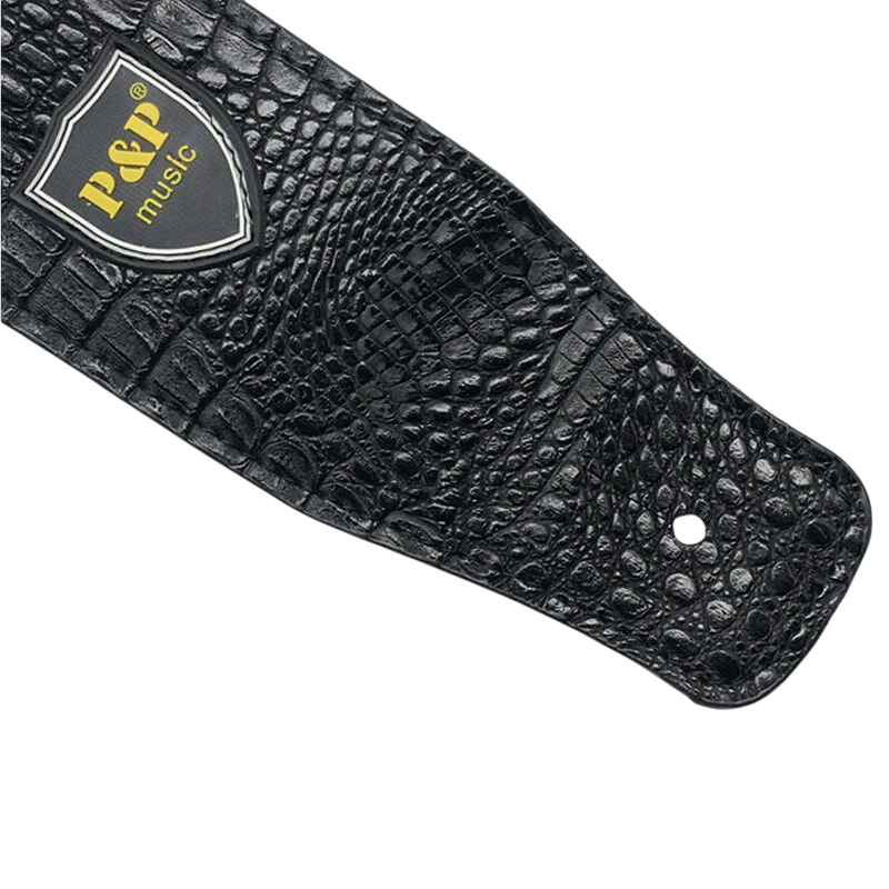 Detailed view of the Prestige PU leather guitar strap with crocodile design in black color.