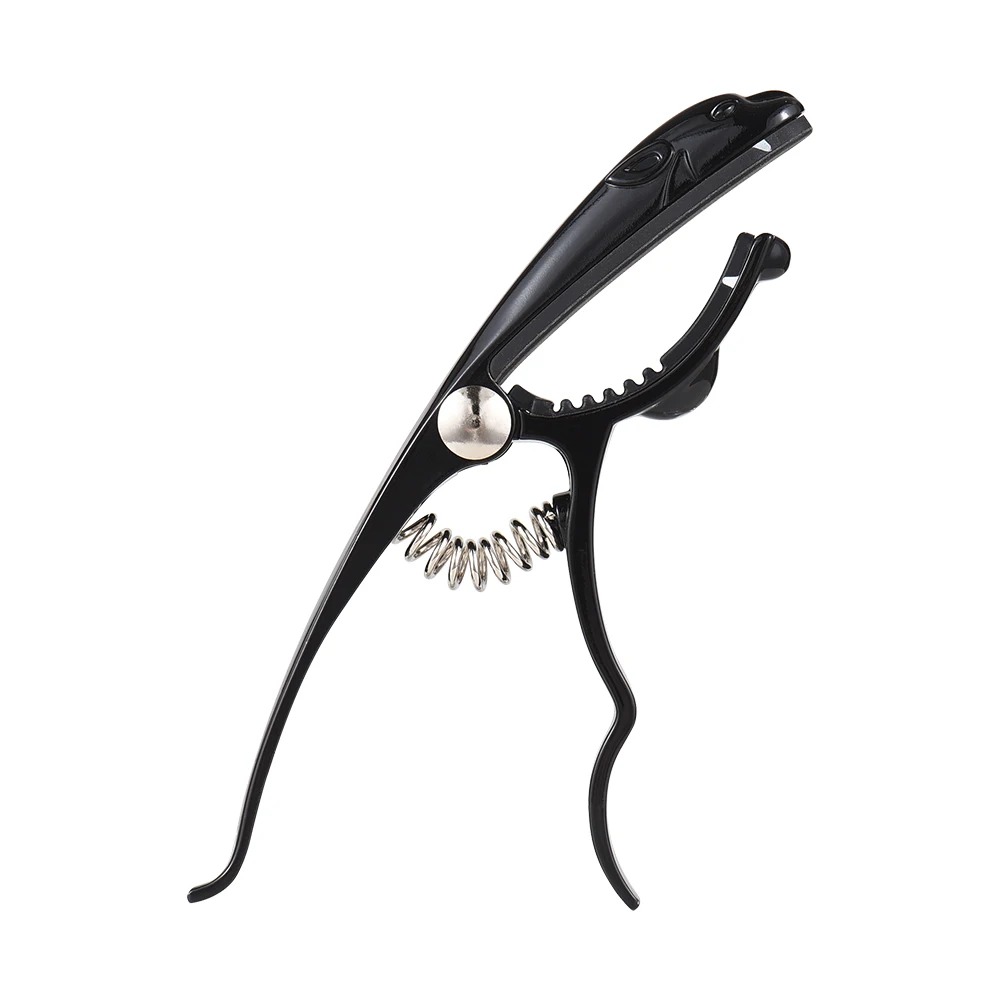General view of a black leopard-shaped capo made of zinc alloy.