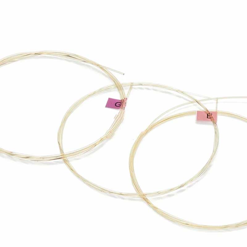 Front view of Classic Nylon Guitar Strings in Gold-Ti Color with Shiny Appearance and Defined Trebles