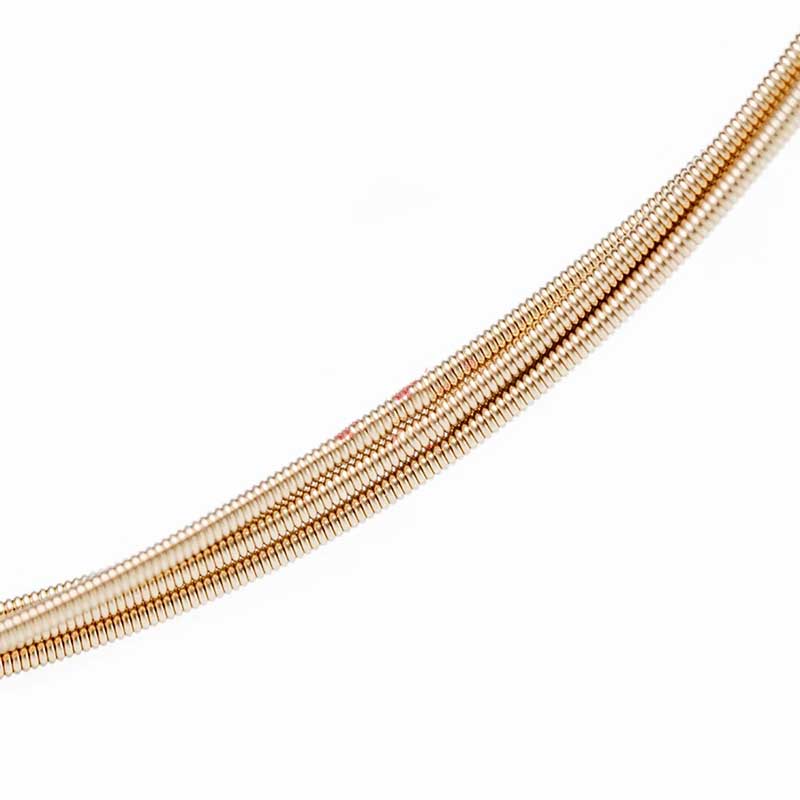 Detailed view of the strings of a 12-string acoustic guitar - Bright sound, textured tone, and comfortable feel