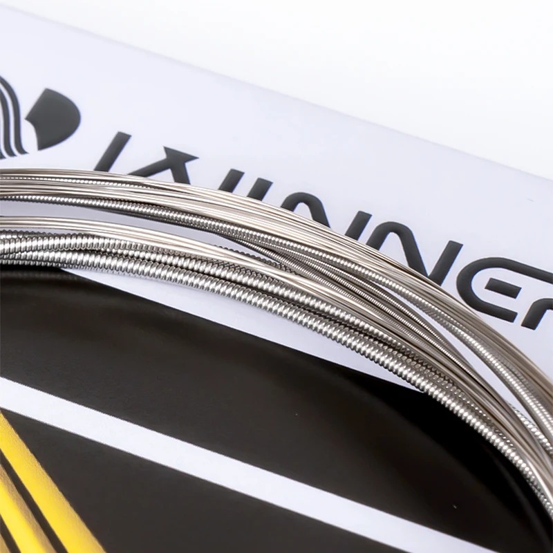 Detailed view of light electric guitar strings suitable for all levels of play