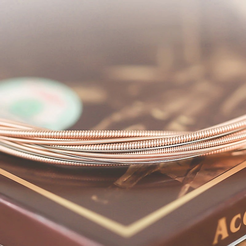 General view of acoustic guitar strings - Phosphor bronze, warm, clear sound, ends of the balls specially marked for easier tuning