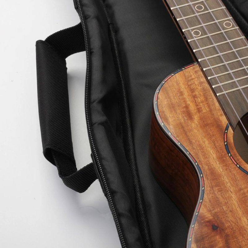 Interior view with Ukulele of the Strap Details of the Aloha Floral Ukulele Case