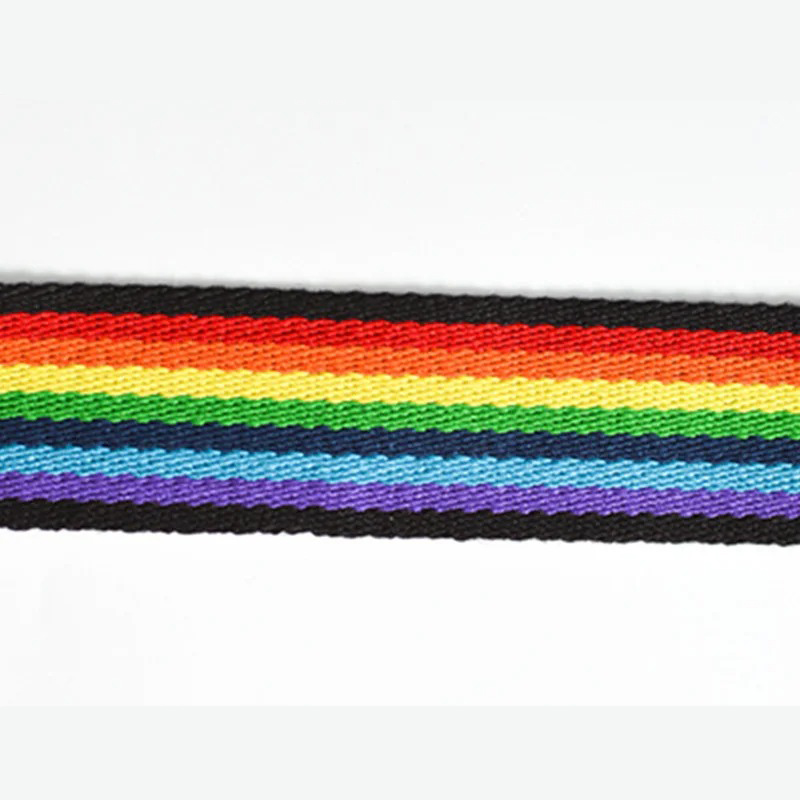 Detailed view of the colorful 'Vibrant Rainbow' guitar strap