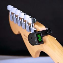 Overview of Digital Guitar Tuner with LCD screen and clamp attachment
