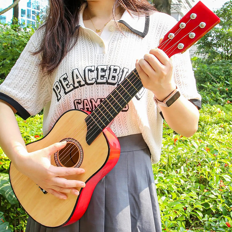 Overall view of the 63 cm children's guitar - Natural wood glow