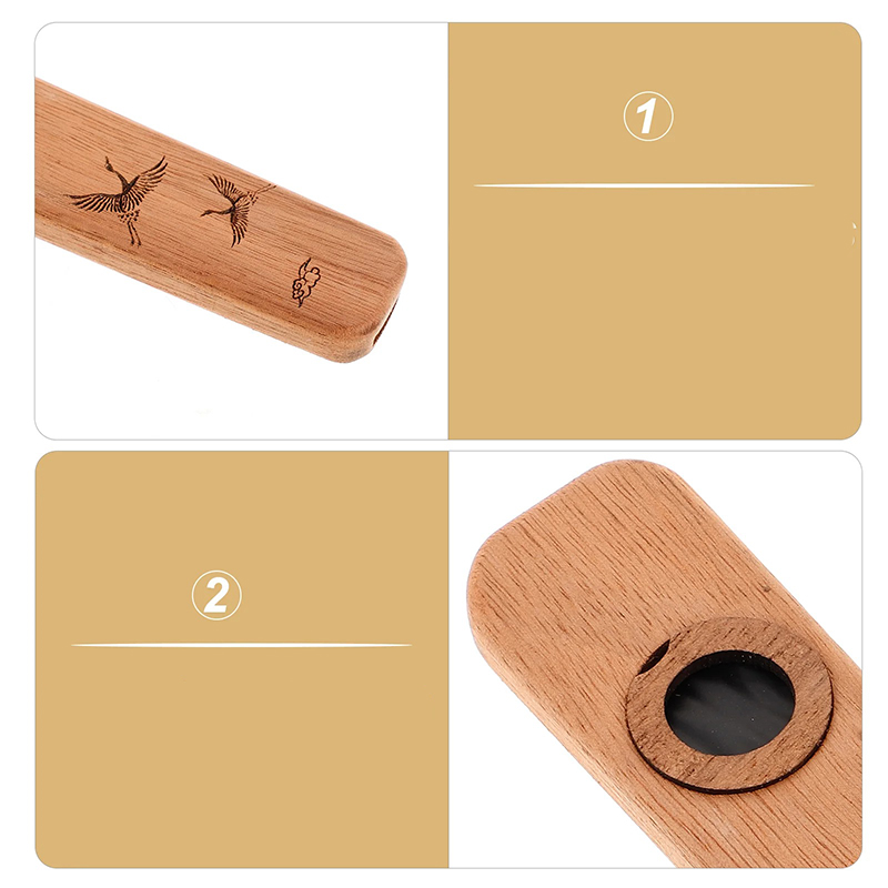 Details of a Wooden Kazoo Engraved with a Pattern of Japanese Cranes and Handcrafted Finish