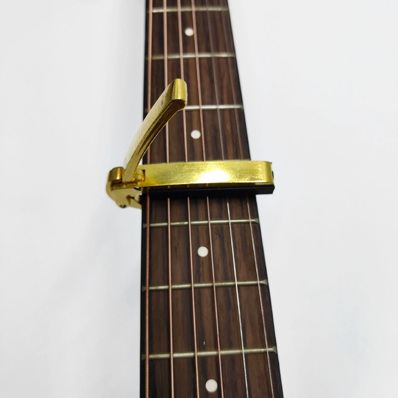 Using the Ergonomic Handle Guitar Capo - Quick and Powerful Clamping