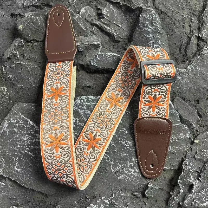 Side view of the vintage guitar strap with a sun mandala