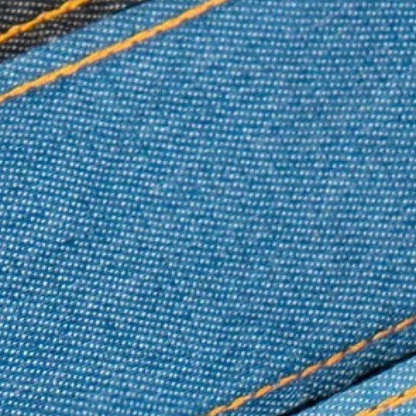 Detail of the weave of the dark blue denim acoustic guitar strap