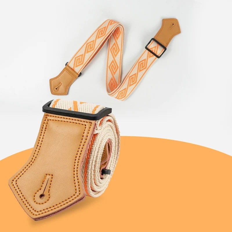 Details of the Vintage Labyrinth Mandarin Orange Guitar Strap