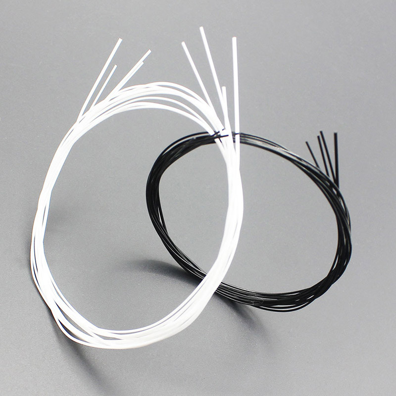 Cordes _ pour ukulélé en nylon - couleur noir ou blanc au choix