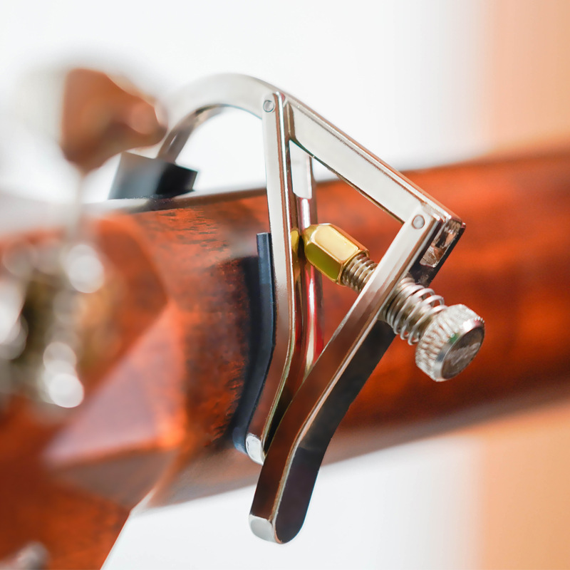 Détails capodastre en alliage de zinc pour guitare électrique ou acoustique
