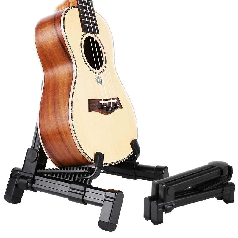 vue complète Mini porte guitare trépied pilant pour guitare
